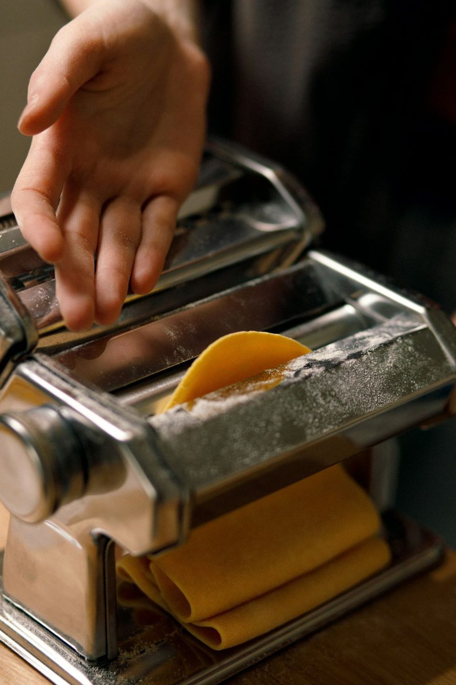 Fresh pasta coming through the pasta machine in Maddy’s galley