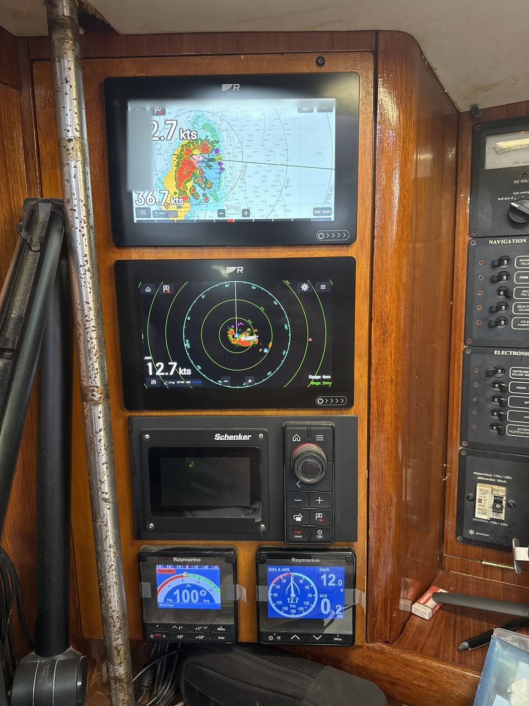 Nav station: dual Raymarine Axiom MFDs, RMK-10 keypad, and twin i70s